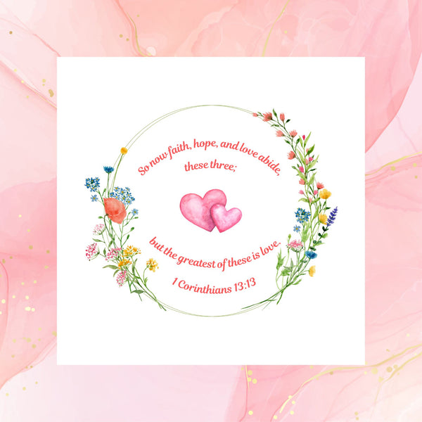 A beautiful Mary, Martha & Meg card featuring the treasured verse, "So now faith, hope, and love abide, these three; but the greatest of these is love." 1 Corinthians 13:13. At the centre of the delicate design are two intertwined hearts. The card is photographed on a pale pink chiffon background with hints of gold swirls. A lovely card to celebrate an engagement, marriage or wedding anniversary.