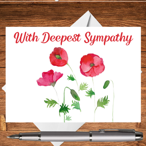 A Mary, Martha & Meg card lovingly created for someone going through a time of loss. The card features a design of three delicately hand-painted red poppies. With Deepest Sympathy is digitally added above the floral design. The edges of a crisp white envelope can be seen behind the card, which rests on a wooden writing surface. A silver pen has been placed beneath the sympathy card. A comforting card to let someone know that you are thinking of them at such a difficult time.