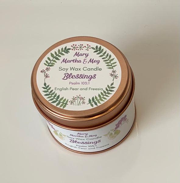 Blessings soy wax candle. The label has a floral design and shows that the fragrance is English Pear and Freesia